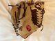 Lefthanded Rawlings 11.75-inch Modified Trapeze Heart Of The Hide Glove