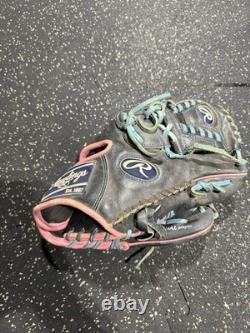 Rawlings Heart of the Hide size 11.75 black pink and light blue broken in